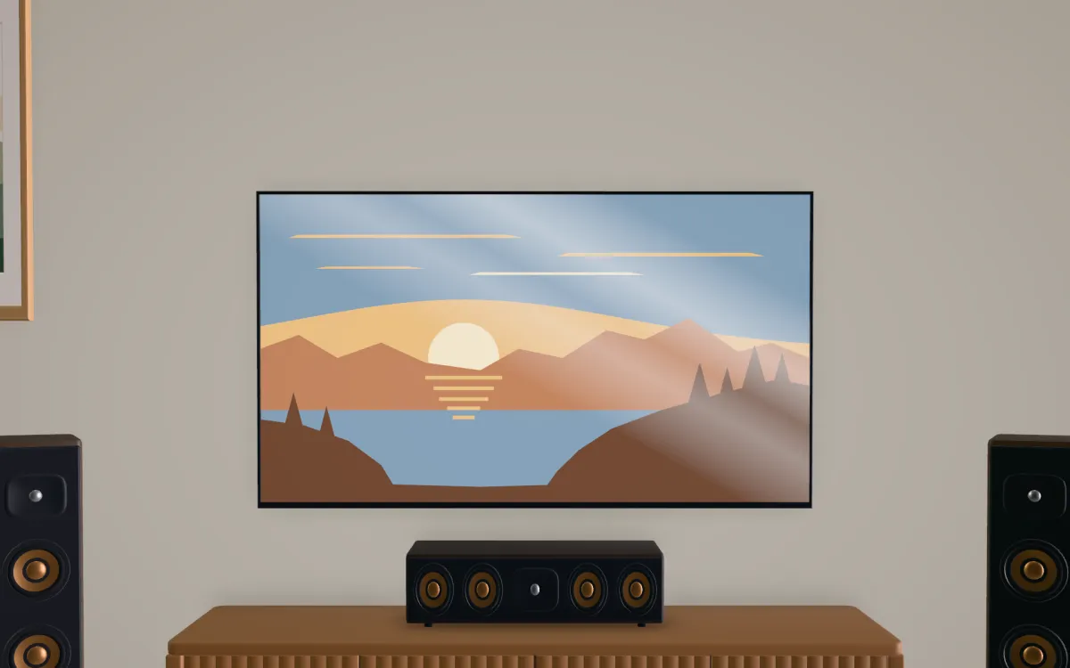 The view from the sofa of a wall-mounted 65-inch TV with the center speaker on the console just below the picture, and the left and right speakers either side.